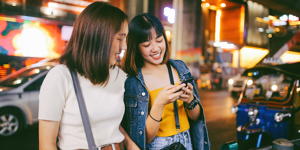girls looking at a phone