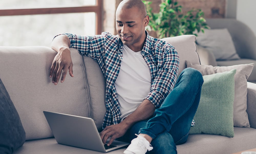 Customer sitting in front of laptop