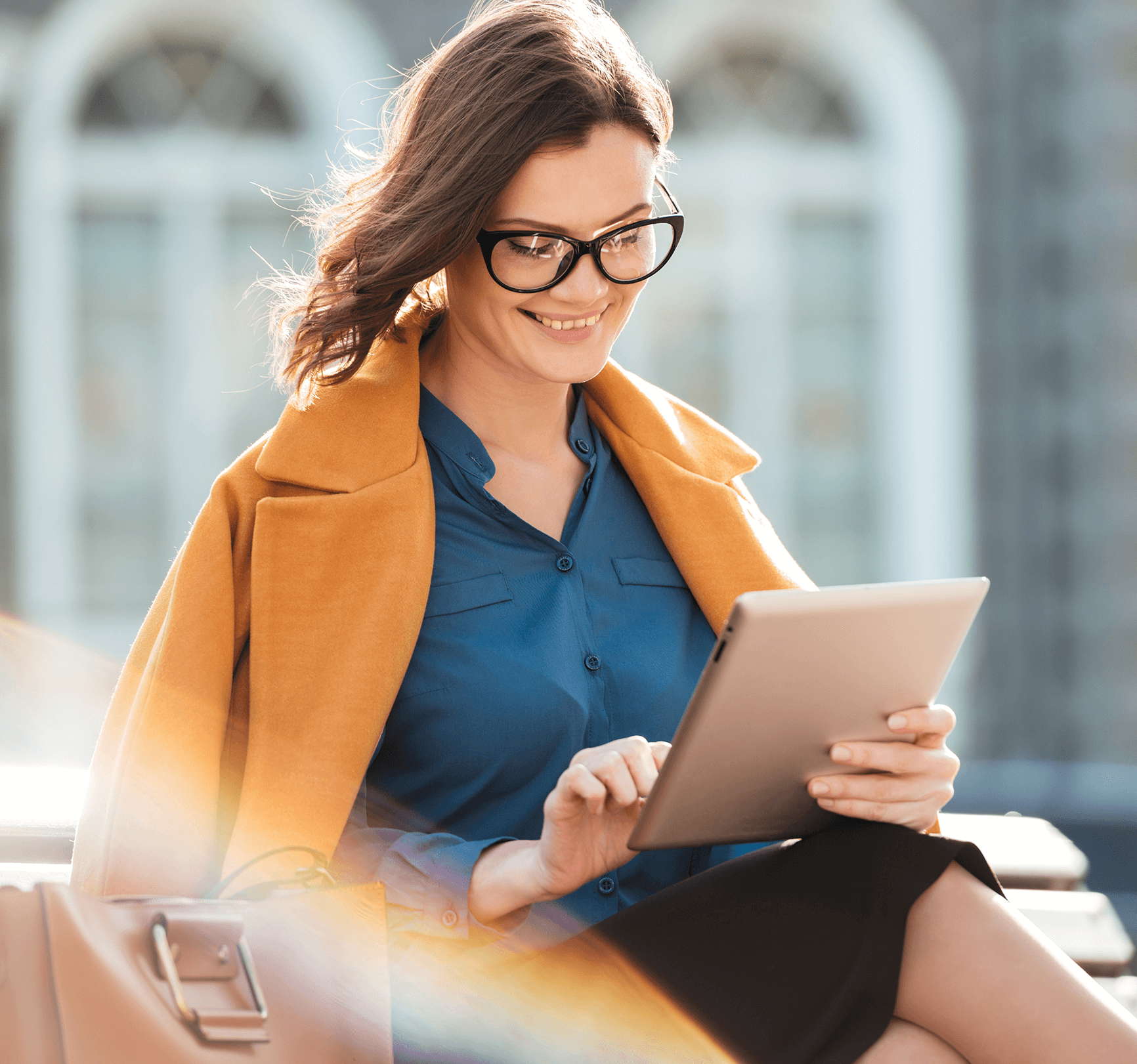 Woman using tablet outside