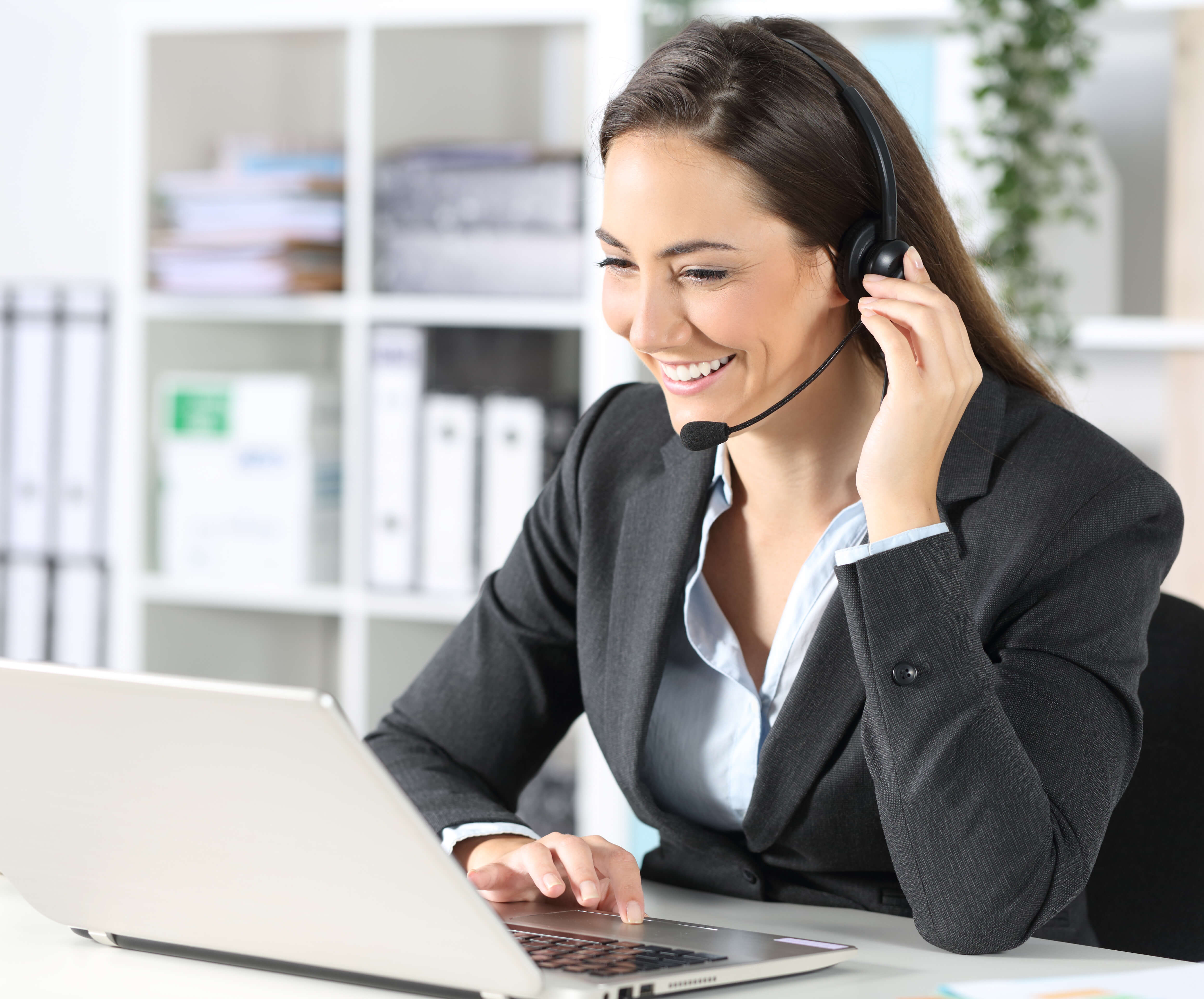 Customer service representative talking on headset